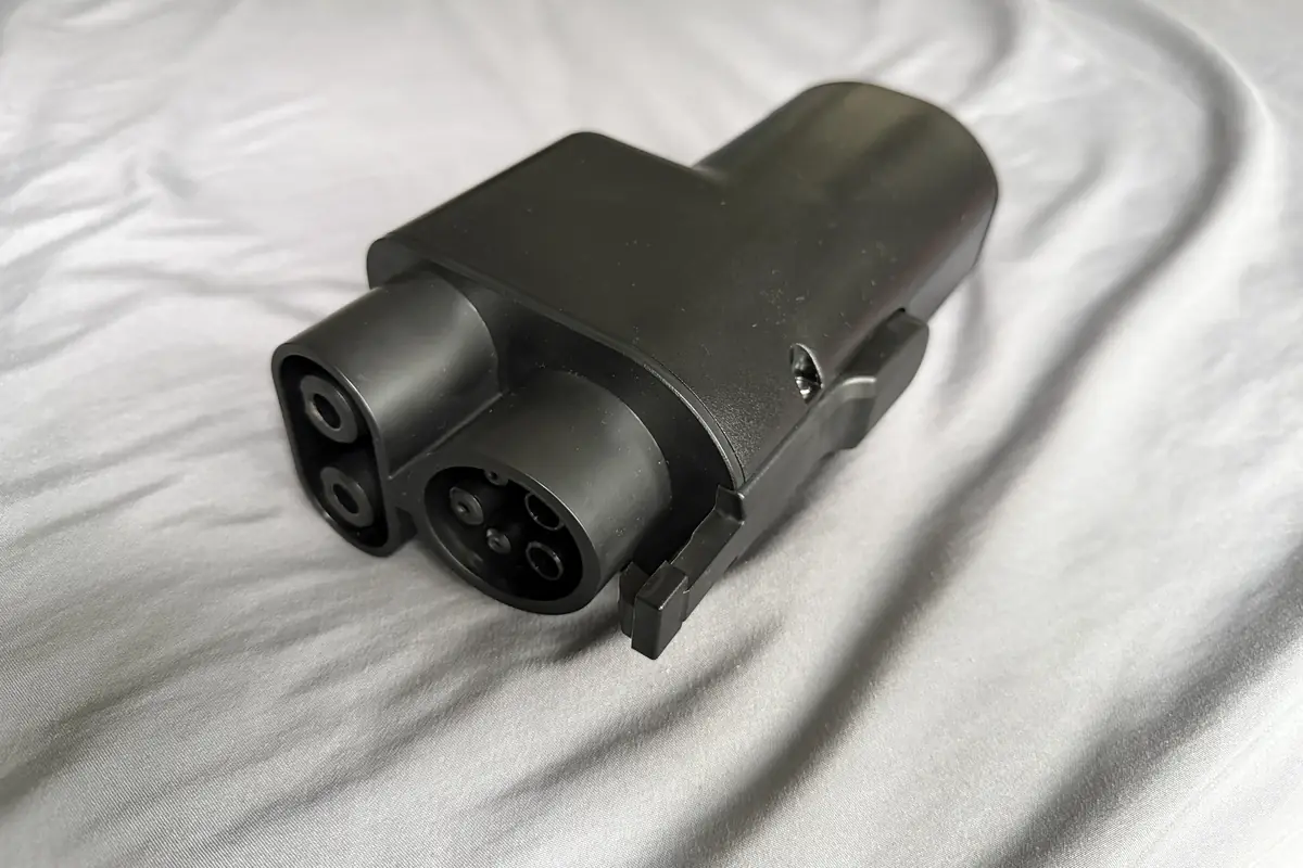 NACS to CCS1 adapter for DC fast charging an electric car