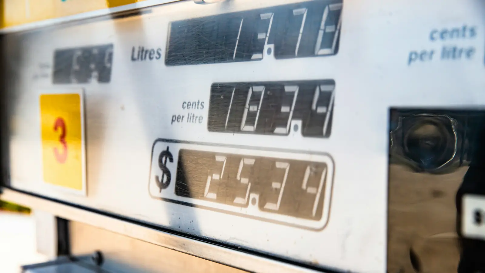 Gas pump display showing litres and cents per litre: how much tax is on gas in Canada